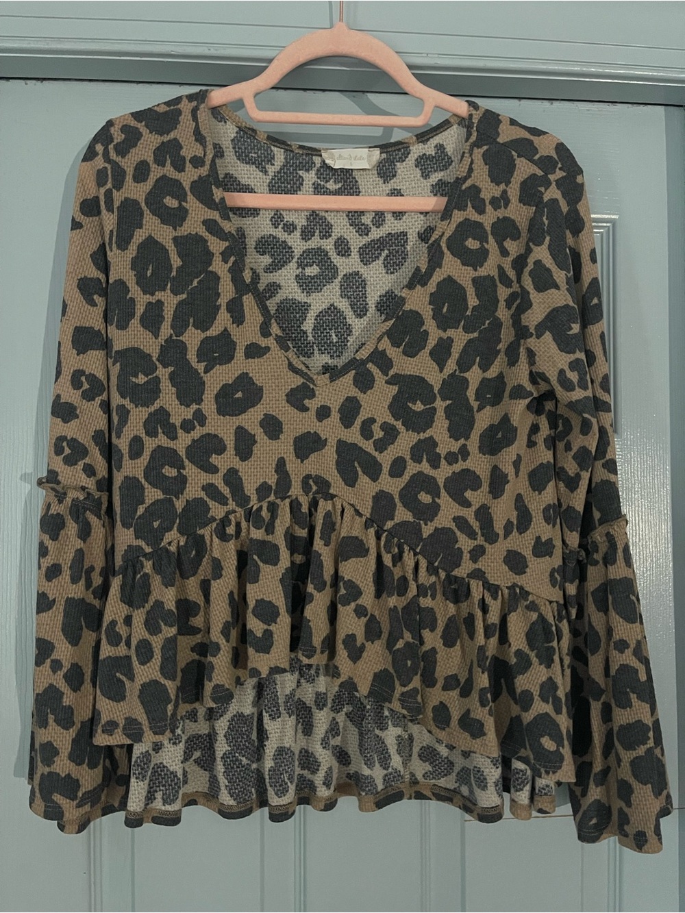 Altar’d State Leopard Print Ruffle Peplum V-Neck Top with flare sleeves